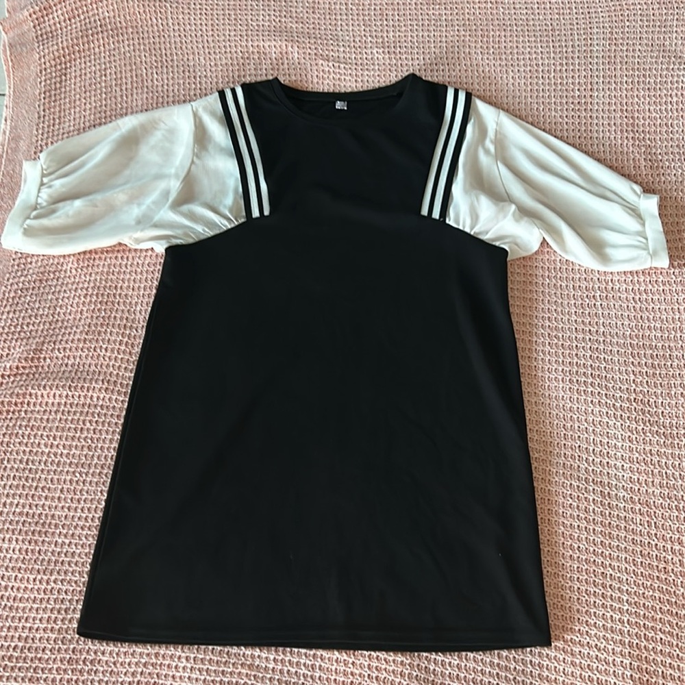 Faux blouse (white) sown into a mid length black dress.  Very comfortable